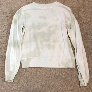 So brand sweater that is light green